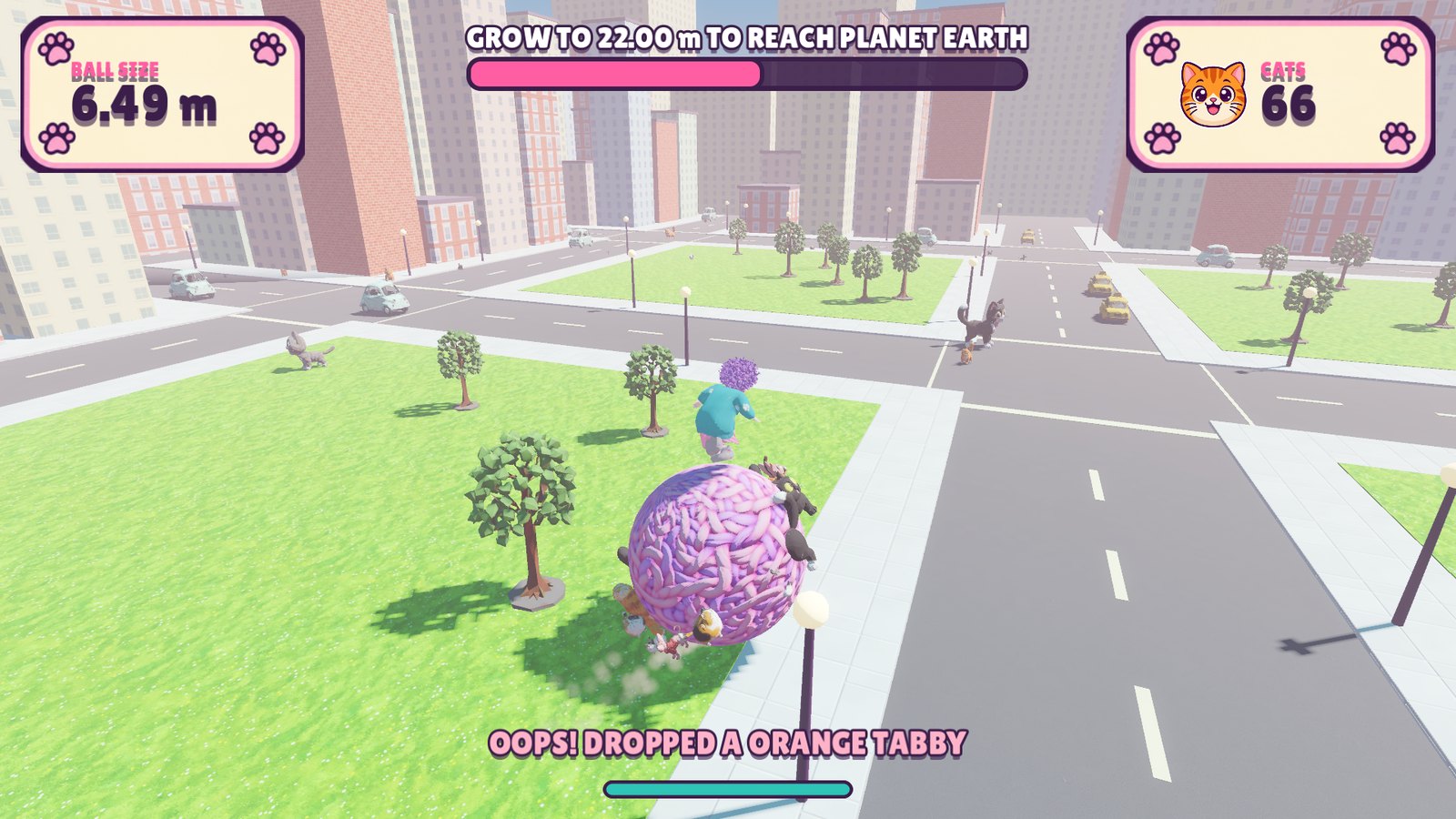 A woman balances on a giant pink yarn ball covered in cats above city streets.